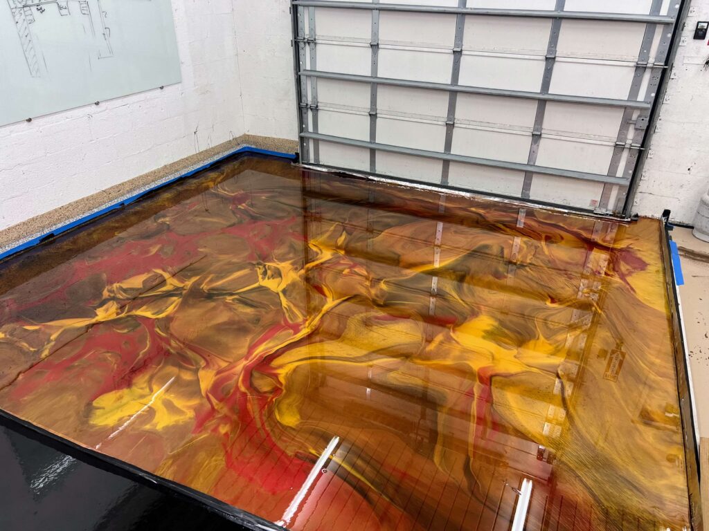 Beautiful Epoxy Garage Floor done with metallics pigment and marbleized resin effect