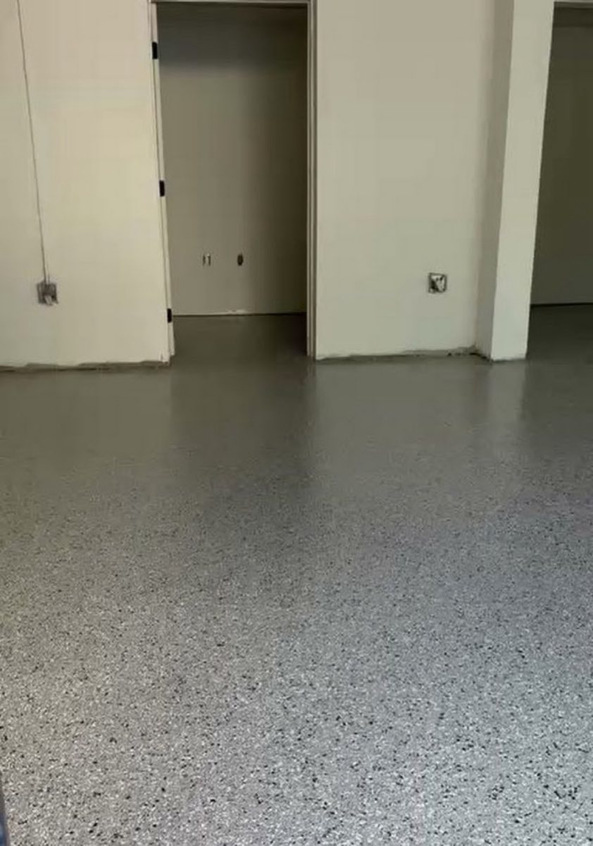 Finished grey flake epoxy garage floor in South Florida