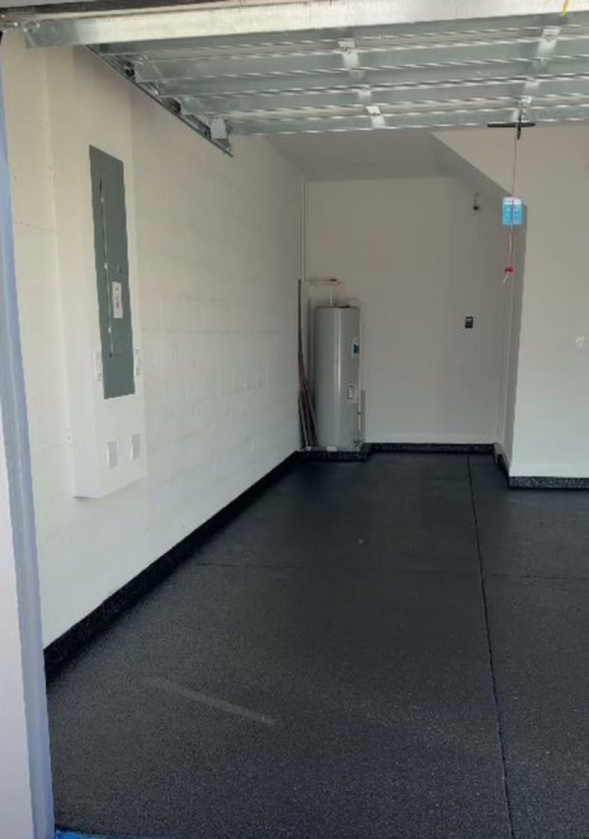 Solid grey coated garage floor system in South Florida