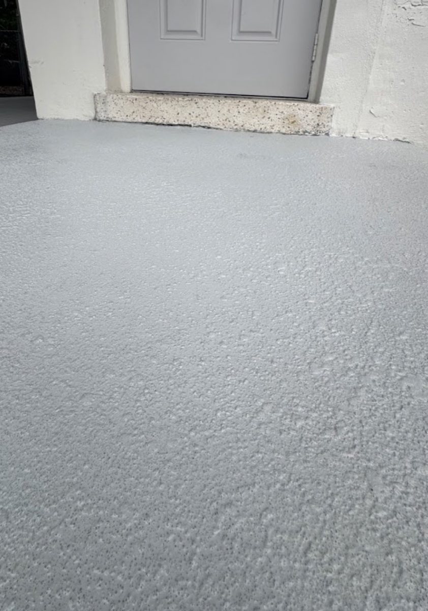 Waterproofed crystalline terrace coating on a South Florida balcony