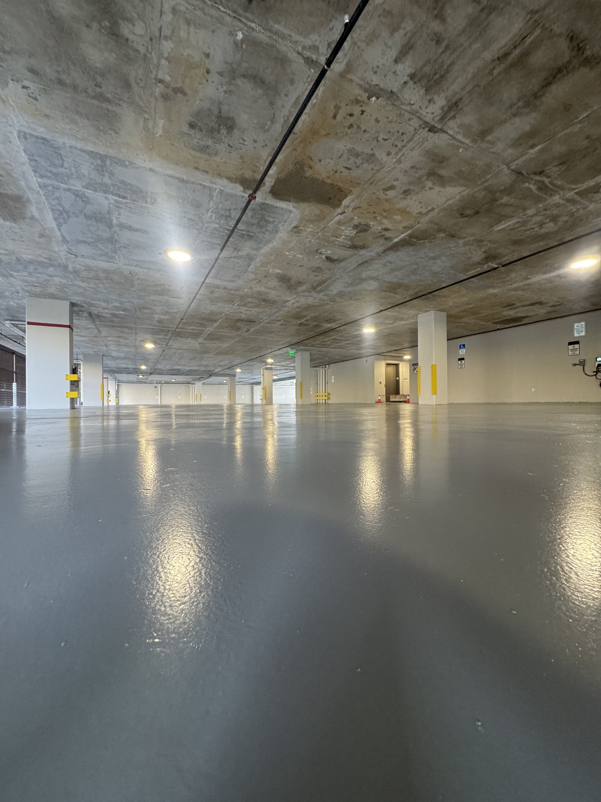 Freshly coated parking garage floor by Suncrete Coatings in Coral Gables, FL