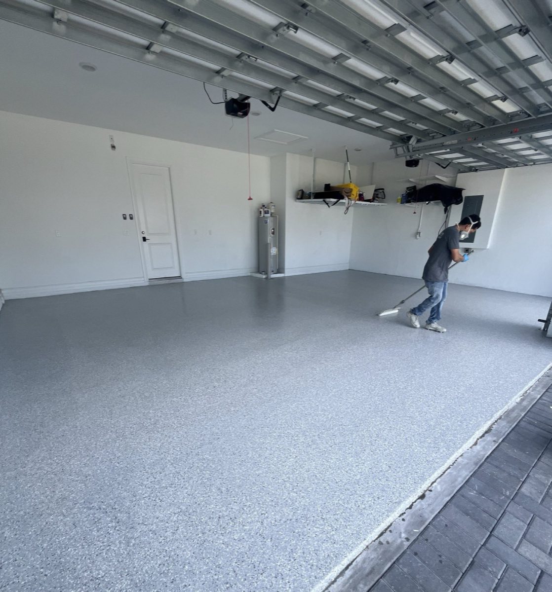 Finished polyurethane topcoat with a satin sheen on a coated concrete slab